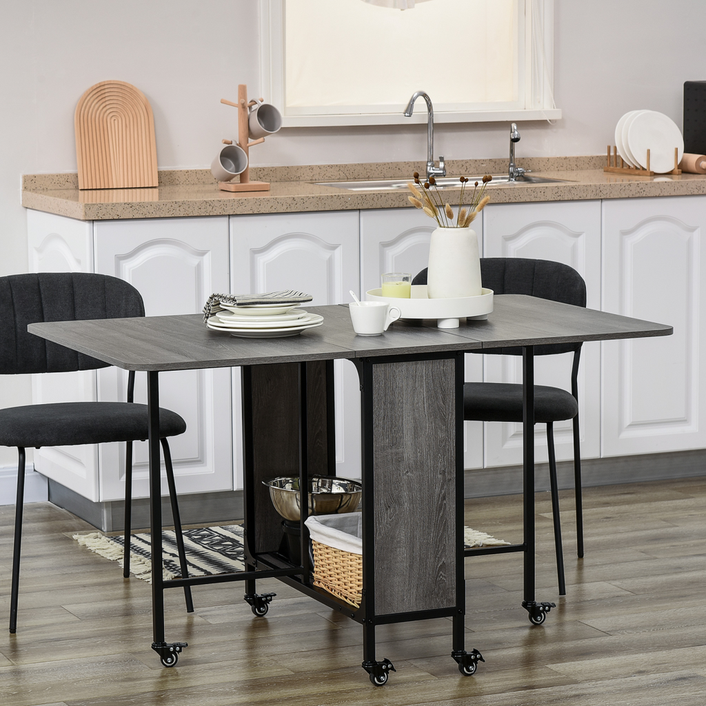 Mobile drop‑leaf folding kitchen table with storage shelves.