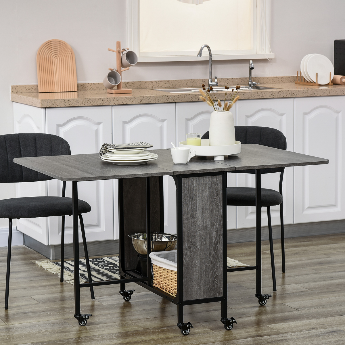 Mobile drop‑leaf folding kitchen table with storage shelves.