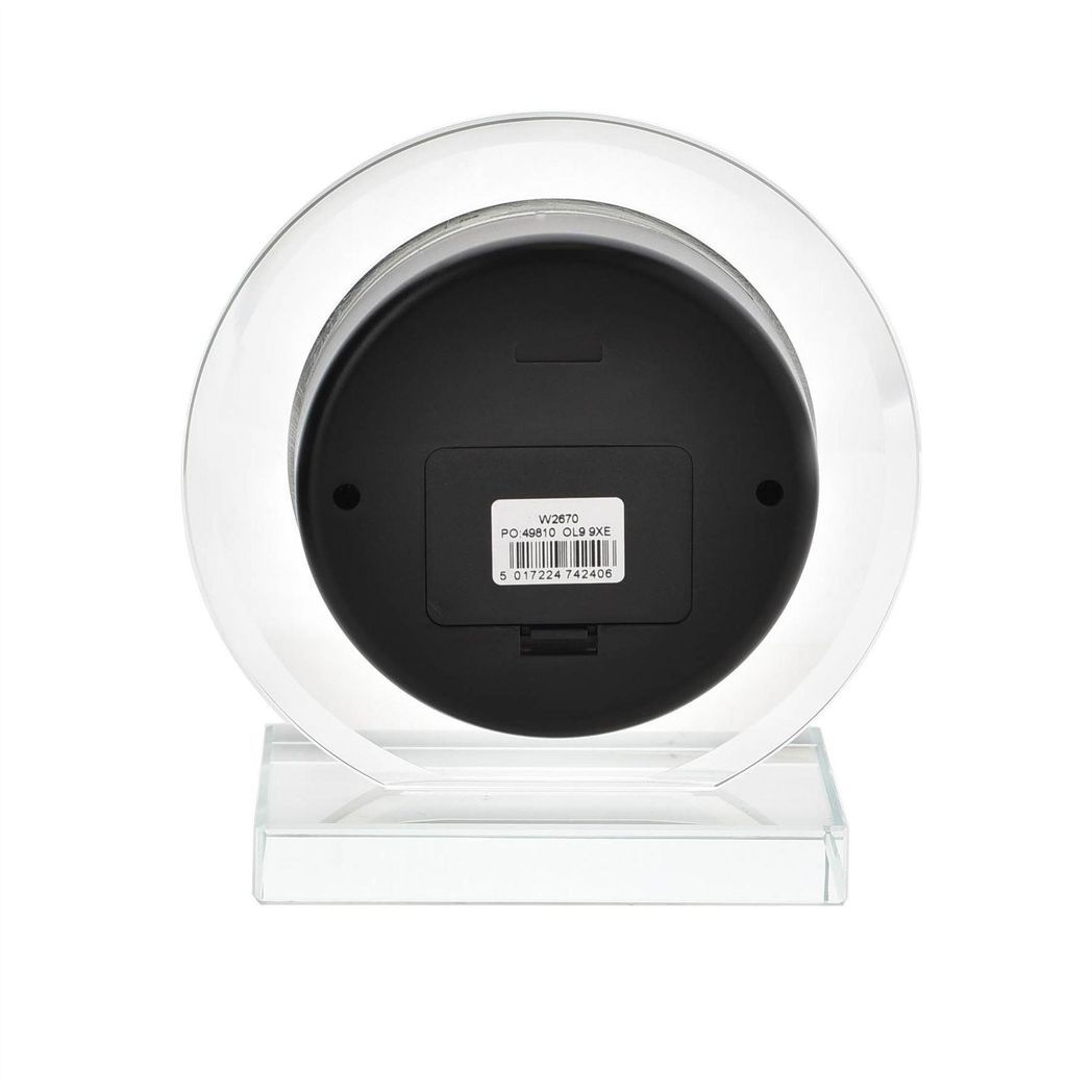 Wm. Widdop round glass mantel clock.
