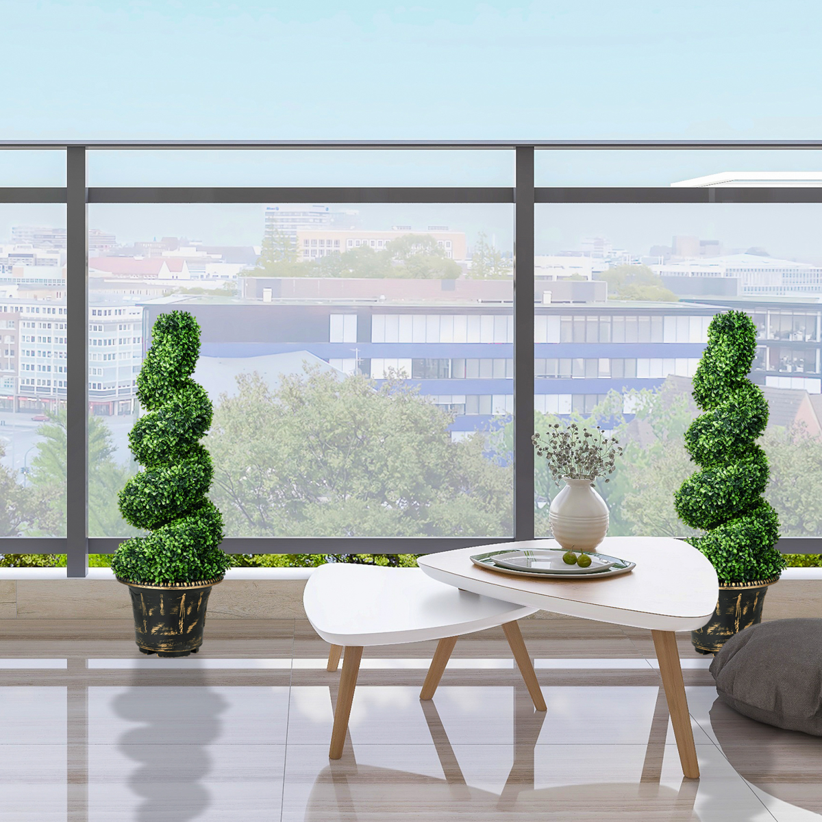 Set of two 90cm spiral boxwood topiary trees.
