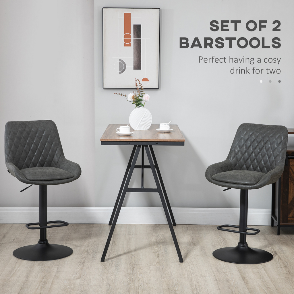 Set of two adjustable grey swivel bar stools with chrome base.