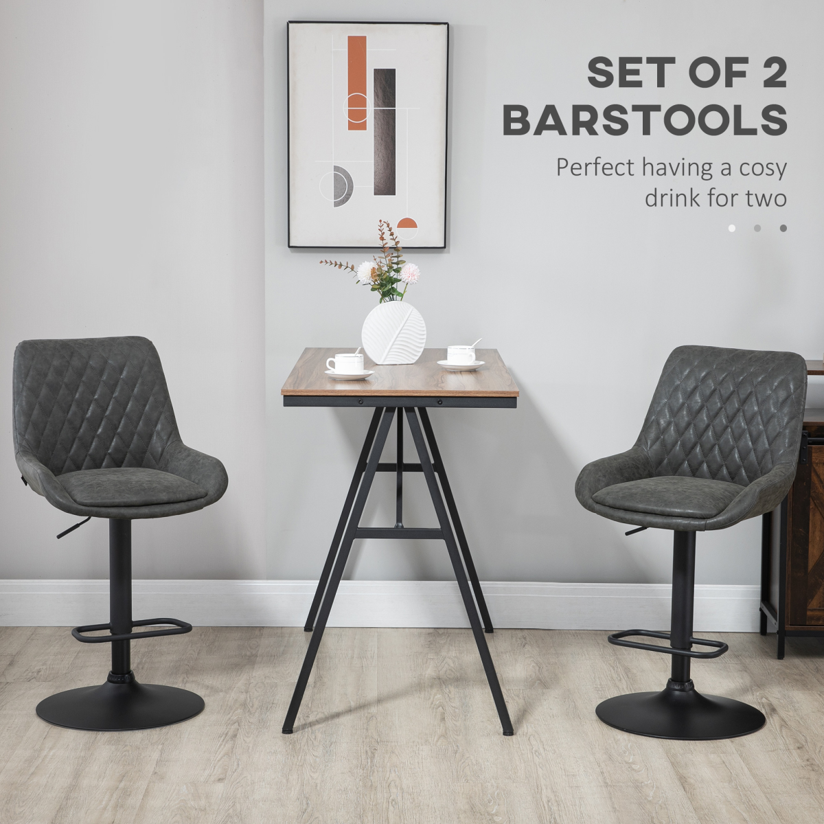 Set of two adjustable grey swivel bar stools with chrome base.