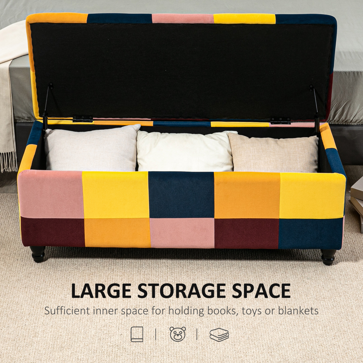 Colour‑block velvet storage ottoman with button‑tufted lid.