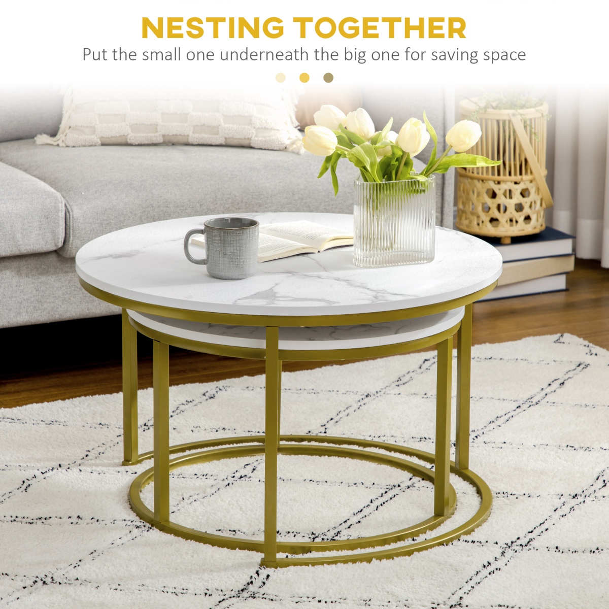 Set of two round marble‑effect nesting coffee tables.