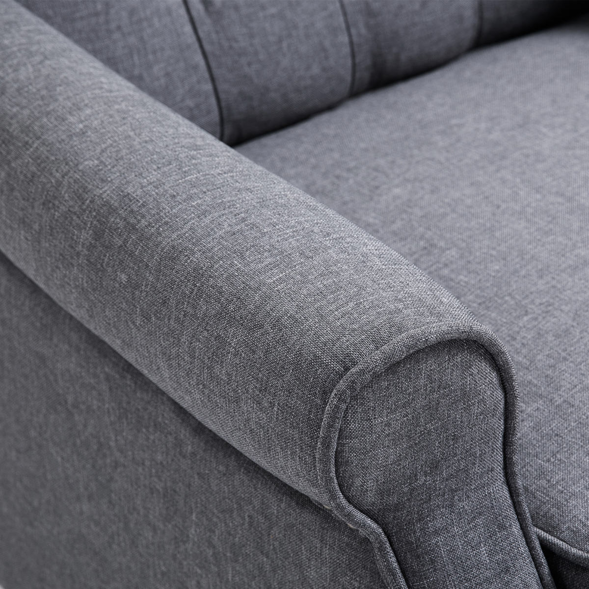 Light grey fabric recliner armchair with footrest.