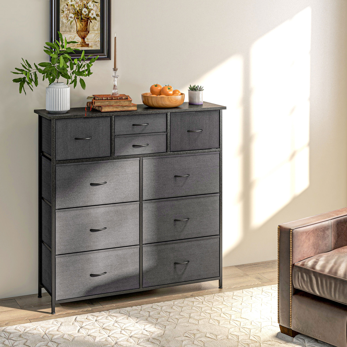 Black fabric chest of drawers with metal frame.
