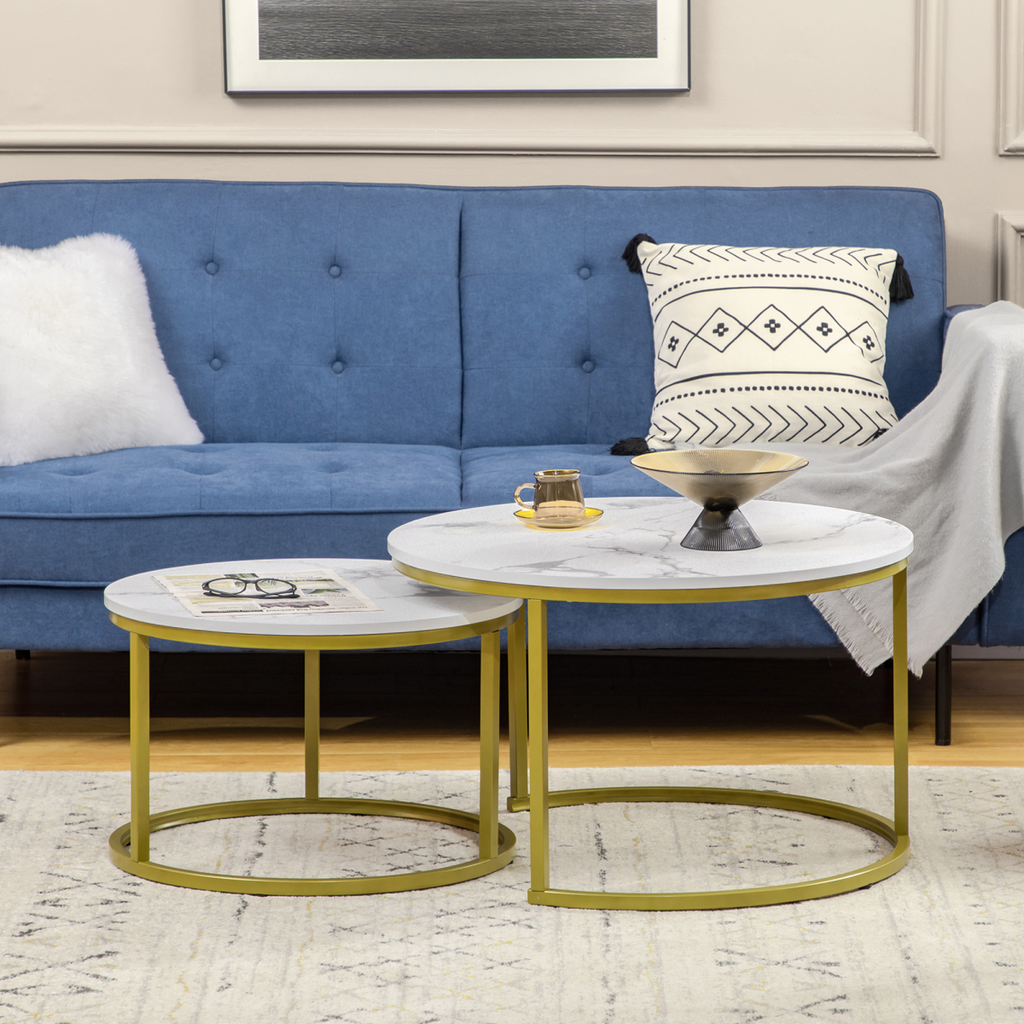 Set of two round marble‑effect nesting coffee tables.