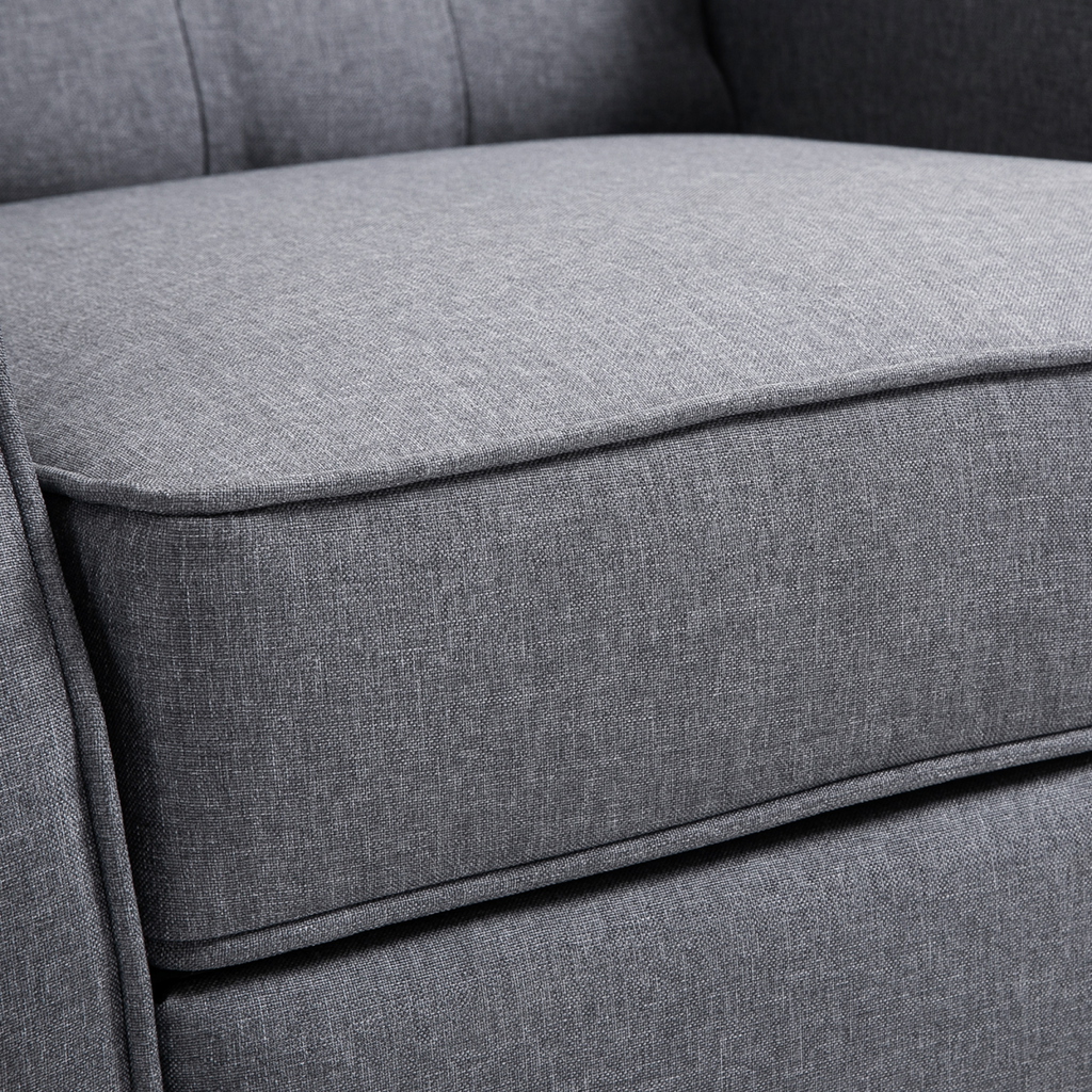 Light grey fabric recliner armchair with footrest.