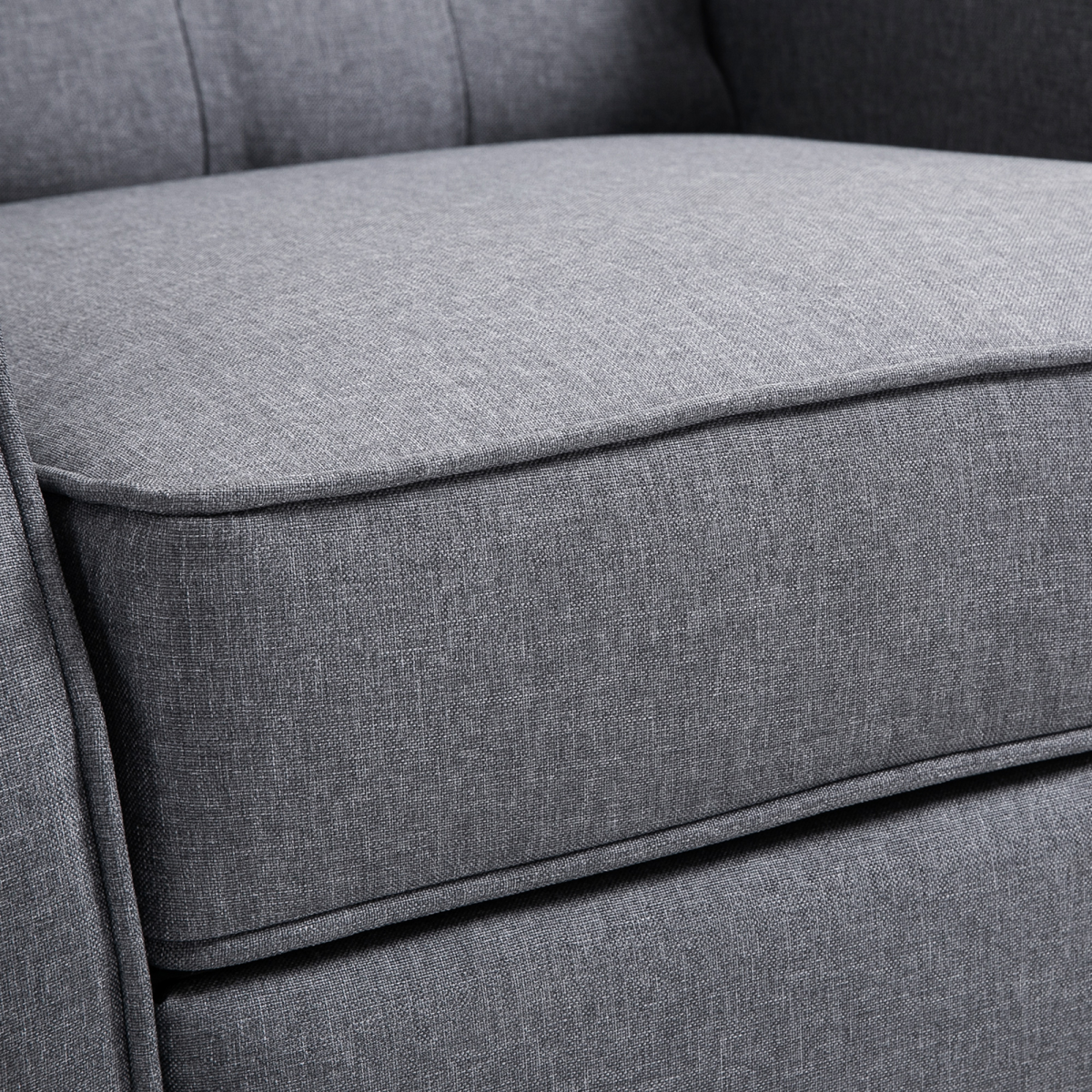 Light grey fabric recliner armchair with footrest.