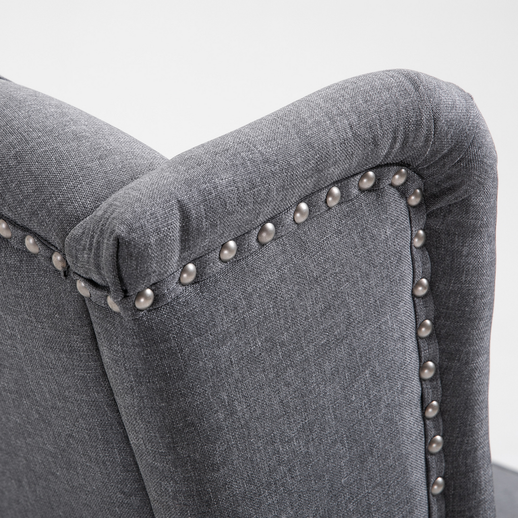 Light grey fabric recliner armchair with footrest.