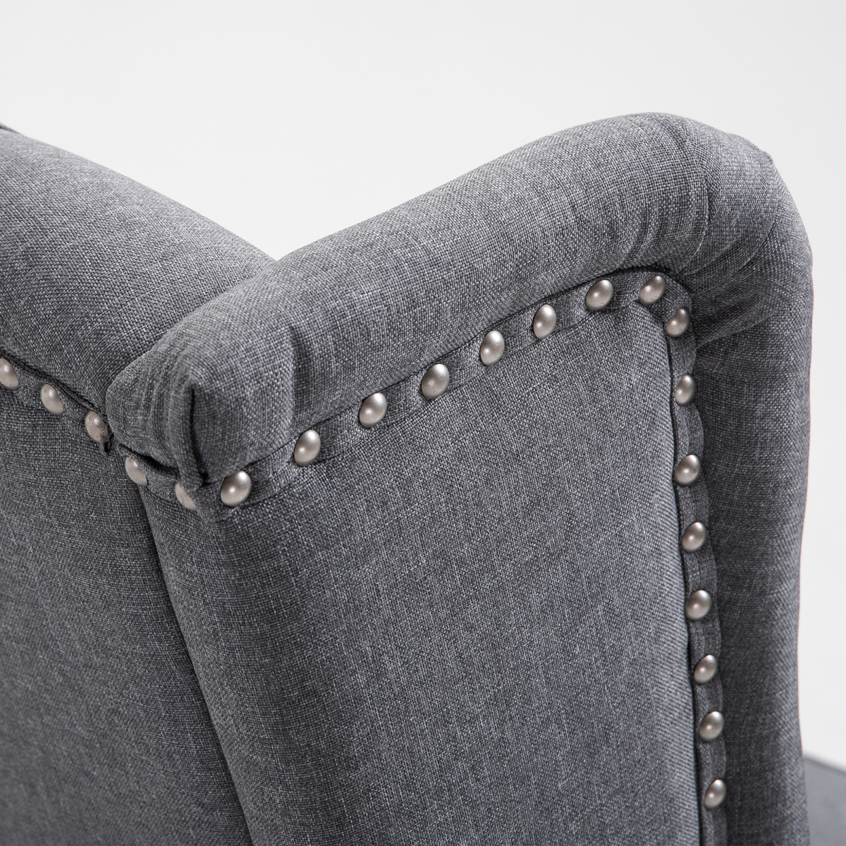 Light grey fabric recliner armchair with footrest.