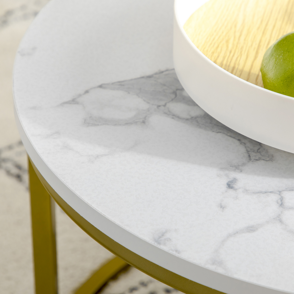 Set of two round marble‑effect nesting coffee tables.