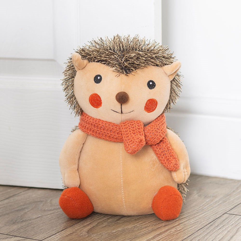 Soft weighted hedgehog doorstop