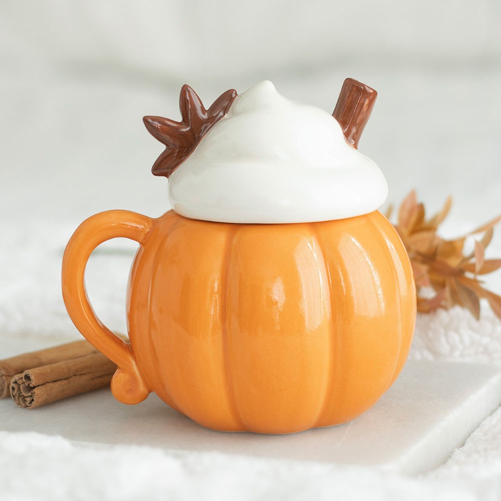 Pumpkin shaped ceramic mug with a cream lid