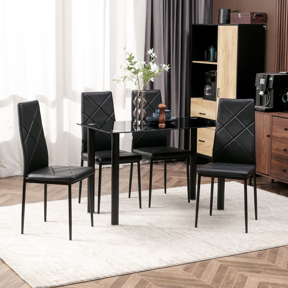 Modern dining table set for four with padded chairs.2.png
