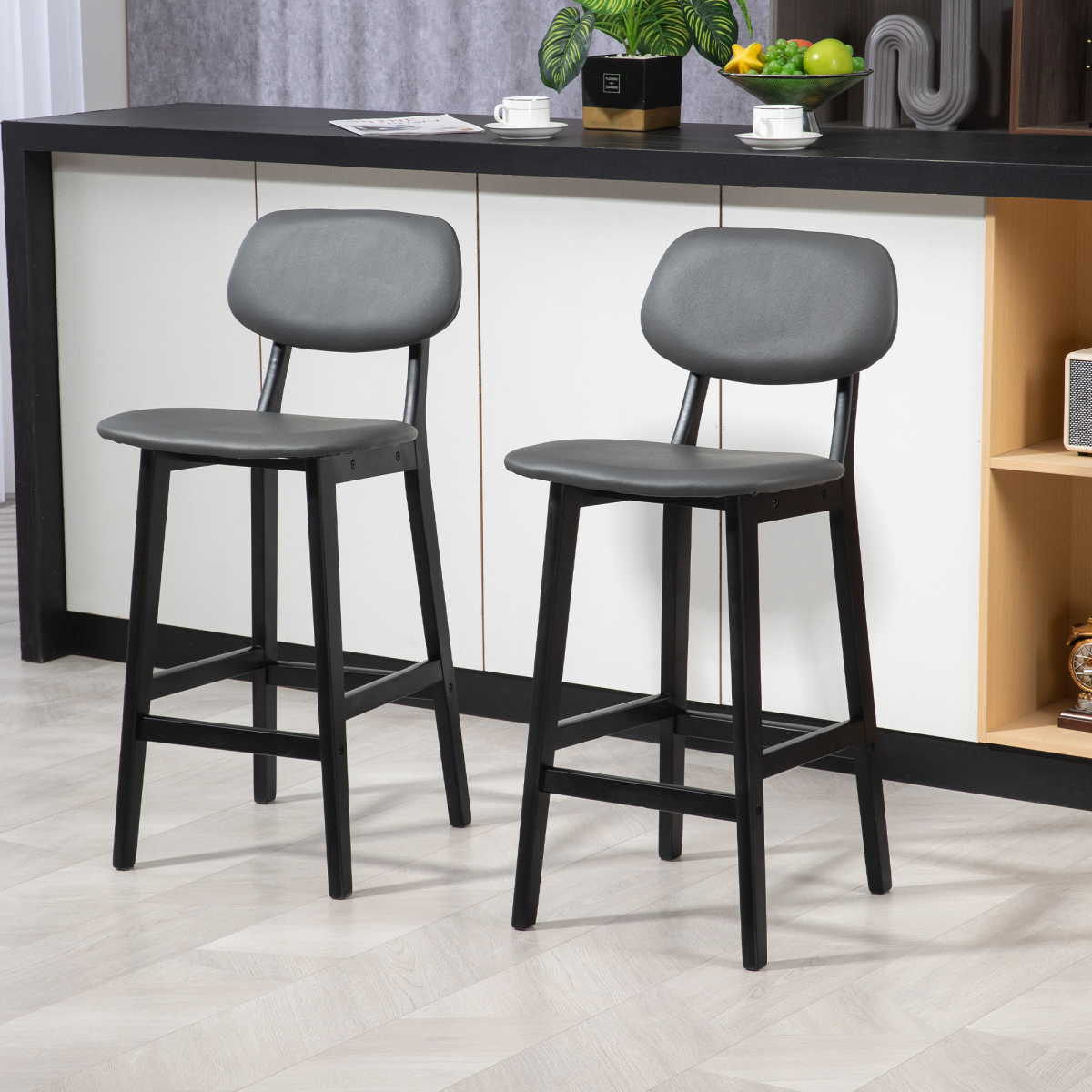 Set of two brown PU leather breakfast bar stools with wooden legs.2.png