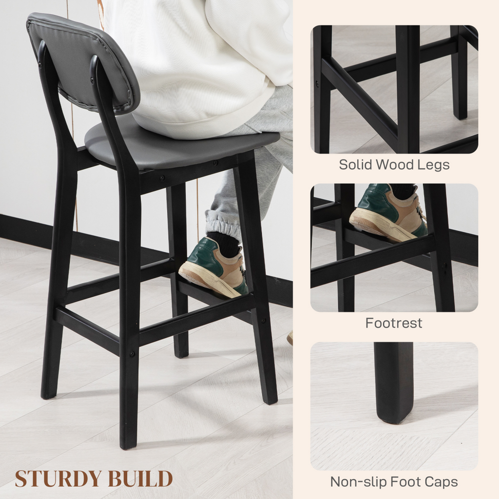 Set of two brown PU leather breakfast bar stools with wooden legs.6.png