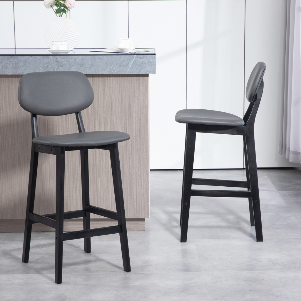 Set of two brown PU leather breakfast bar stools with wooden legs.7.png