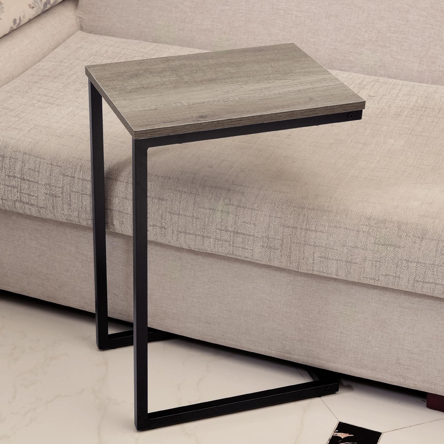 Black C‑shaped slide‑under side table.