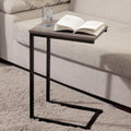Black C‑shaped slide‑under side table.