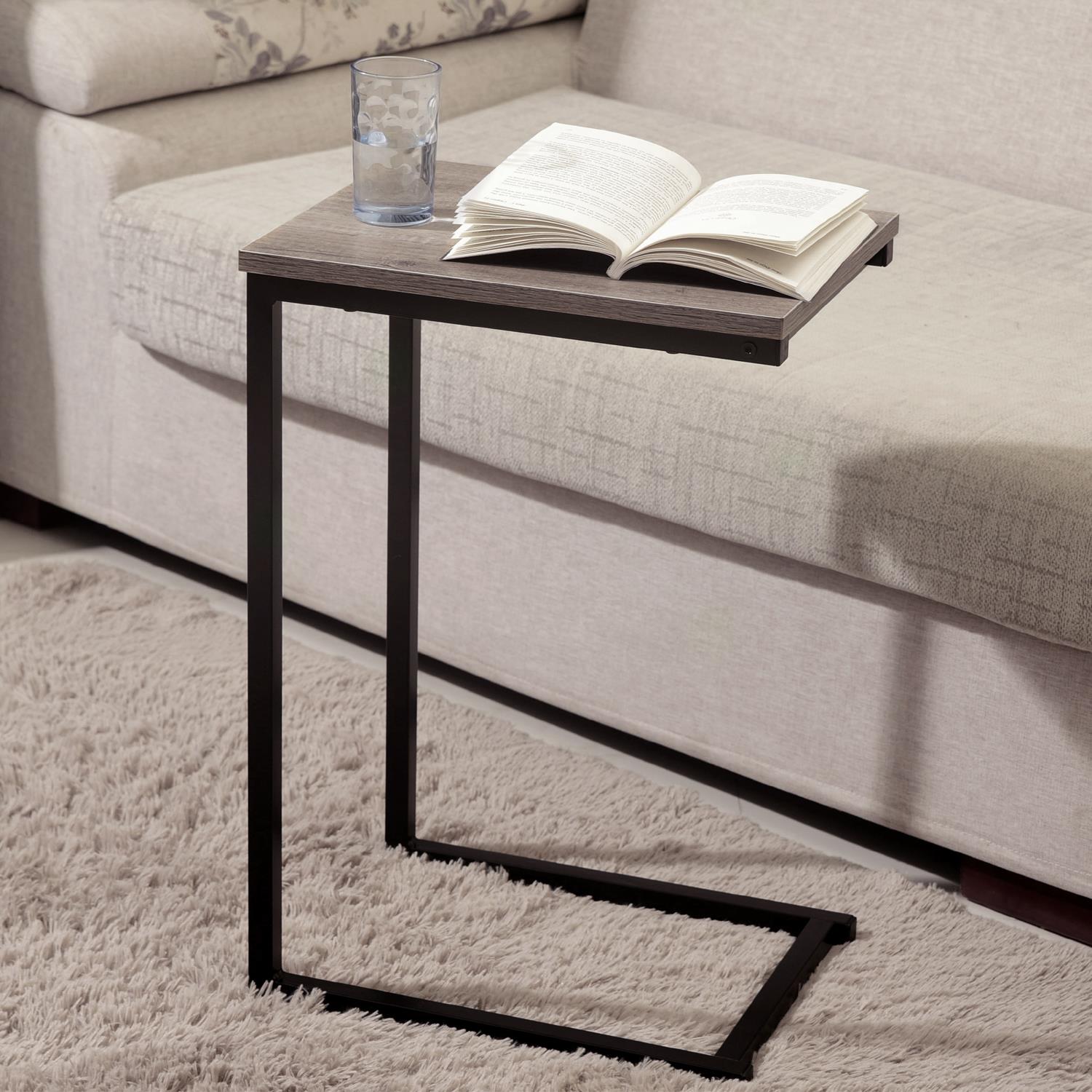 Black C‑shaped slide‑under side table.