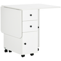 White drop‑leaf folding dining table with storage drawers.